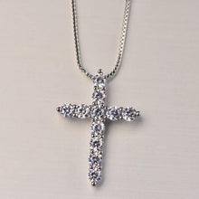 Load image into Gallery viewer, #SHOPEMMASOFIA #EMMASOFIA #SILVERCROSSNECKLACE SHOPEMMASOFIA.COM The most simple yet the most powerful piece of jewelry in anyone's collection. One of our favorites and best selling pieces. Classic sterling silver faith cross with box style chain.