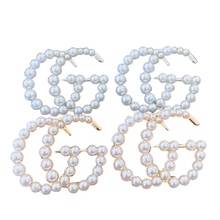 Load image into Gallery viewer, Strike Pearl Studded Earrings. Romantic pearl edition of the strike Designer Inspired studded earrings. Pair perfectly with your favorite set of pearls or layered pendants. Available in Silver and Gold. 3 cm Please follow jewelry care instructions to maintain your pieces quality and integrity. #SHOPEMMSOFIA