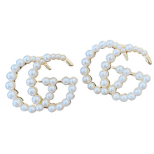 Load image into Gallery viewer, Strike Pearl Studded Earrings. Romantic pearl edition of the strike Designer Inspired studded earrings. Pair perfectly with your favorite set of pearls or layered pendants. Available in Silver and Gold. 3 cm Please follow jewelry care instructions to maintain your pieces quality and integrity. #SHOPEMMSOFIA