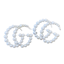 Load image into Gallery viewer, Strike Pearl Studded Earrings. Romantic pearl edition of the strike Designer Inspired studded earrings. Pair perfectly with your favorite set of pearls or layered pendants. Available in Silver and Gold. 3 cm Please follow jewelry care instructions to maintain your pieces quality and integrity. #SHOPEMMSOFIA