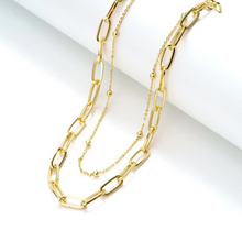 Load image into Gallery viewer, Emily Double Choker Necklace A double layered paperclip and beaded chain choker. Dreamy lightweight gold plated layer starter with toggle clasp. Available in Silver and Gold. Paperclip Chain 41 cm Beaded Chain 32 cm Please follow jewelry care instructions to maintain your pieces quality and integrity.
