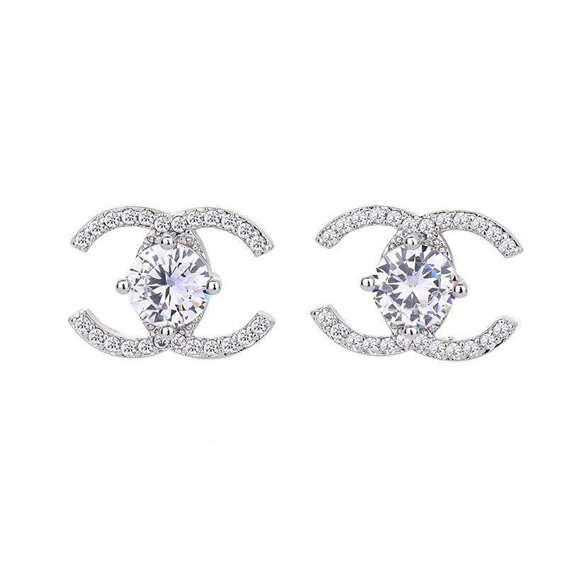 Glam Diamond Studded Earrings.  Limited designer inspired studded diamonds earrings. Bring the bling to the office or girls night out. Just plain stunning! Limited quantities. Available in Silver and Gold.  1.7 cm  Please follow care instructions to maintain your pieces quality and integrity. #shopemmasofia