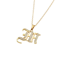 Load image into Gallery viewer, Stunning studded old english initial pendant necklace. Wear you own initial or honor someone special in your life. Available in gold.  Pendant 2 cm  Chain 45 cm  Please follow care instructions to maintain your pieces quality and integrity. #shopemmasofia
